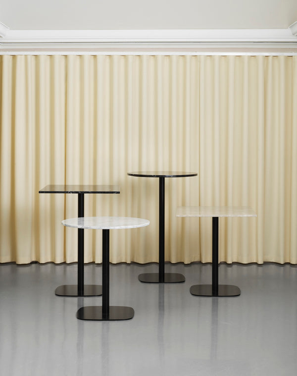 Table de café Form Ø70cm — Acier inoxydable